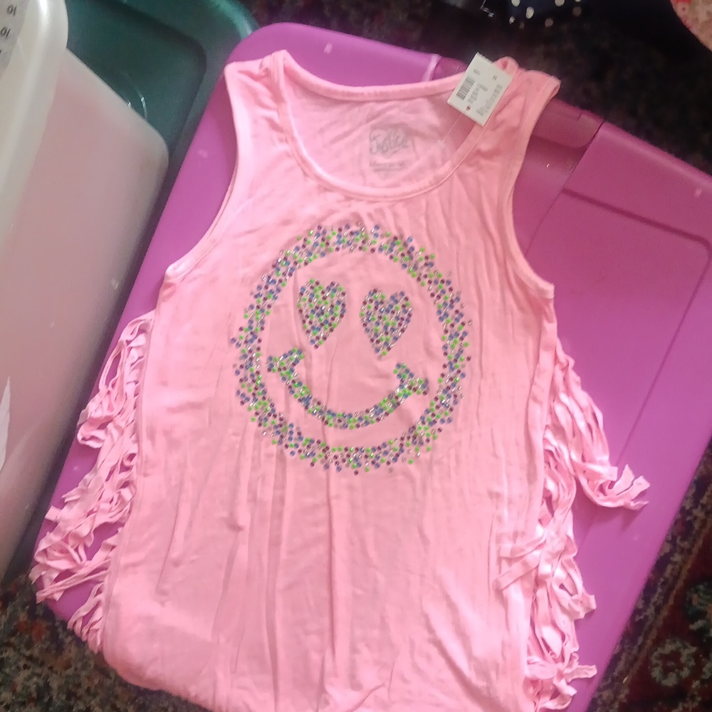 Pink tank top with fringe and happy face embellishments